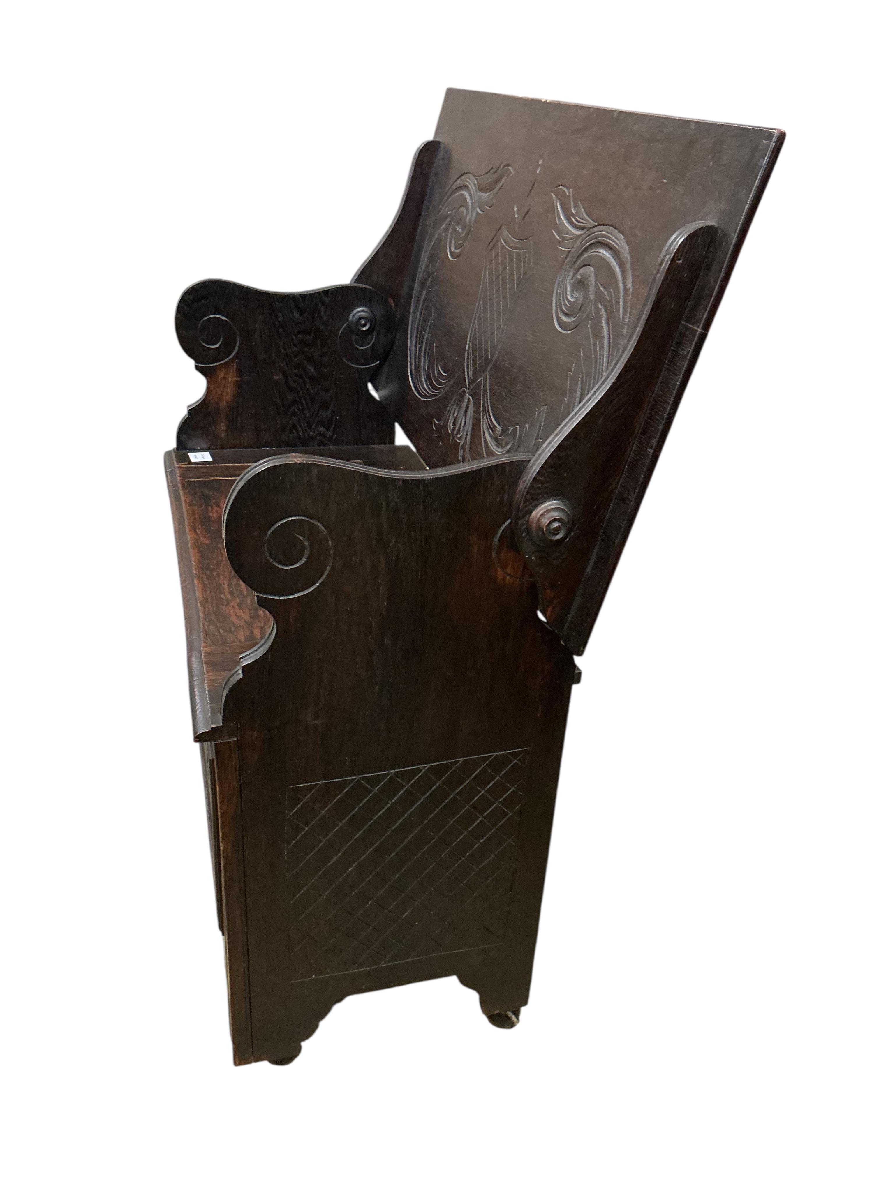 A small 1920's oak monk's bench, width 91cm, depth 46cm, height 106cm